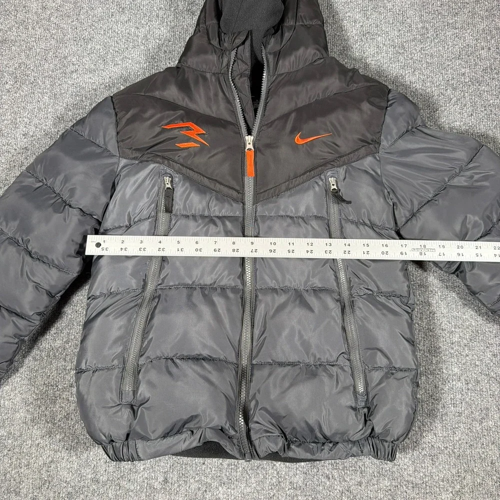 Nike 3Brand Puffer Jacket Kids Large‎ Black Orange Russell Wilson Hooded